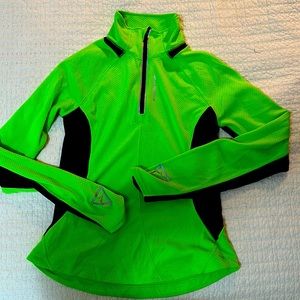 Brooks long sleeve, half zip running top. New with out tags. Never worn.
